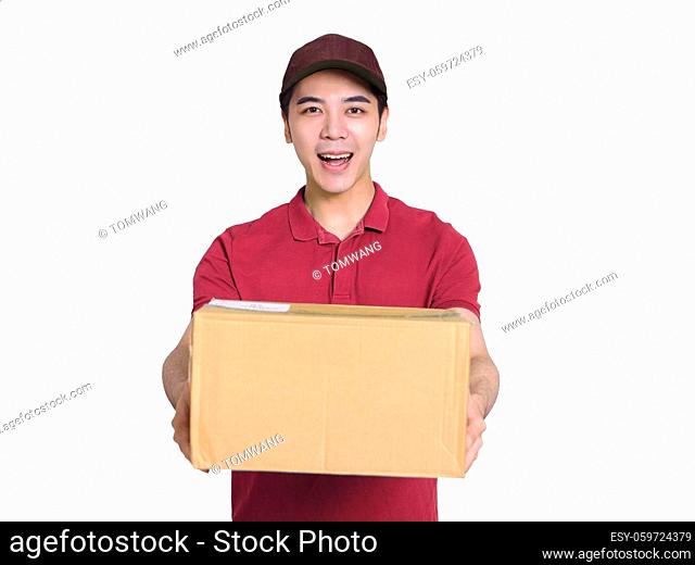 Young deliveryman holding a carton of goods