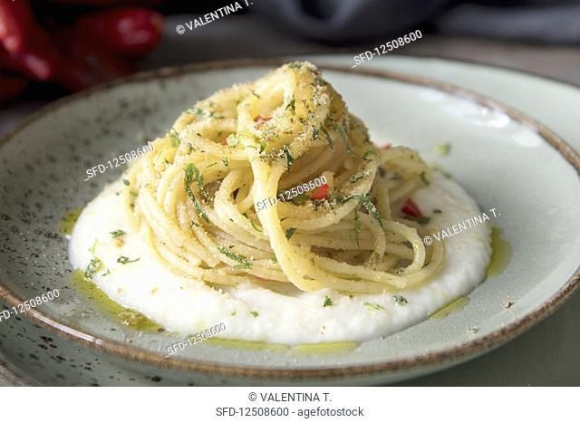 Spaghetti aglio olio e peperoncino on cauliflower foam