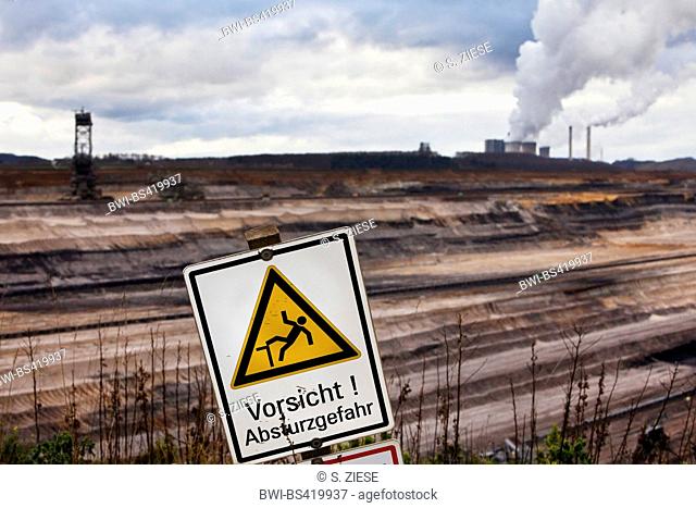 warning sign in front of brown coal surface mining Inden, Germany, North Rhine-Westphalia, Inden
