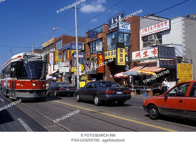 Toronto, Canada, Ontario, Trolley runs along the Dundas Street and Chinatown in downtown Toronto