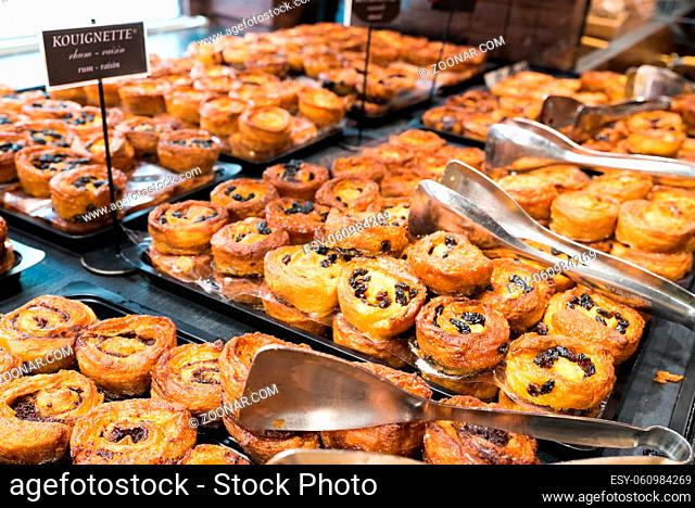 Honfleur, Calvados / France - 15 August 2019:delicious typical Breton kouignette cakes in different styles in a bakery