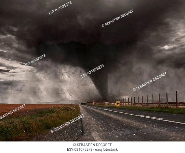 View of a large tornado destroying the landscape