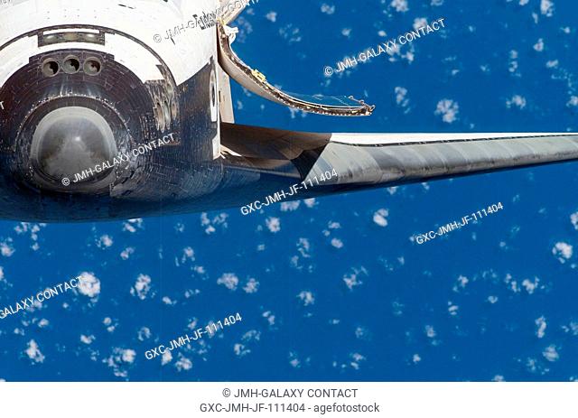 A close-up view of the exterior of Space Shuttle Endeavour's nose, port wing and payload bay door was provided by Expedition 16 crewmembers on the International...