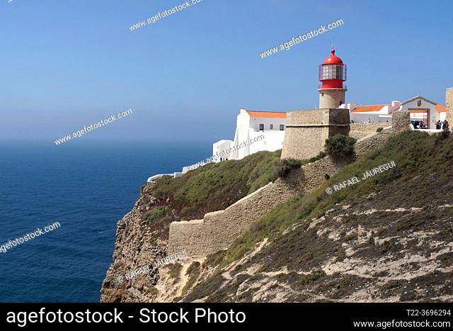 Sagres (Algarve) Portugal. Perspective of the Cape of San Vicente with the lighthouse in the first place