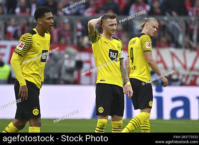 From left: Jude BELLINGHAM (Borussia Dortmund), Marco REUS (Borussia Dortmund), Erling HAALAND (DO), disappointed, frustrated, rejected, action