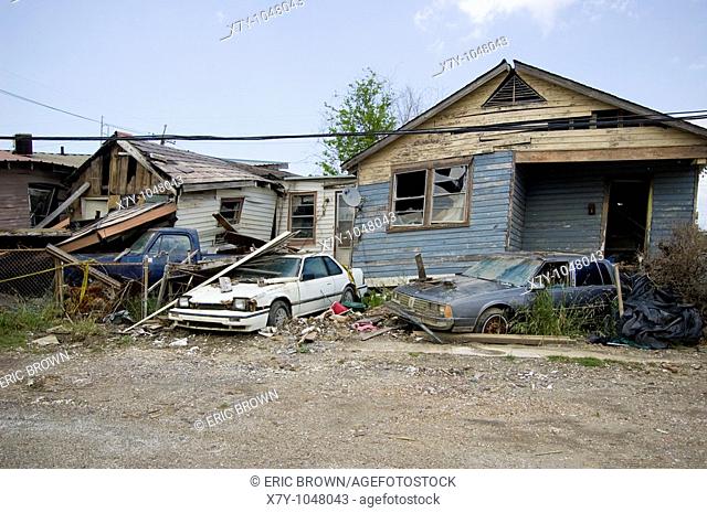 Cars and homes lie in rubble 9 months after Hurricane Katrina, in the Lower Ninth Ward, New Orleans