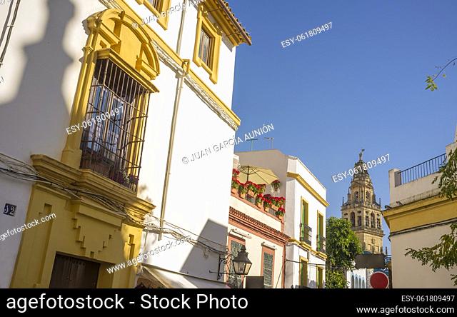 Cordoba historic quarter overview, Andalusia, Spain. Yellow Balcony with wrought iron