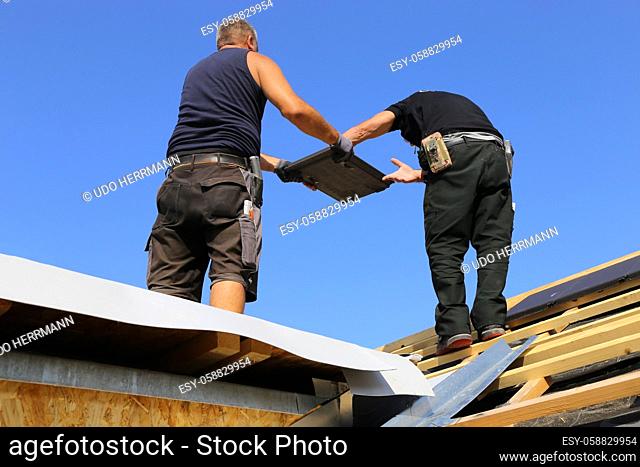 Roofing work, new covering of a tiled roof