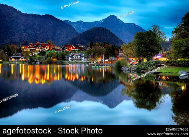 Dramatic and picturesque scene at evening lake Grundelsee. Mirror reflection.. Location: resort Grundlsee, Liezen District of Styria, Austria, Alps