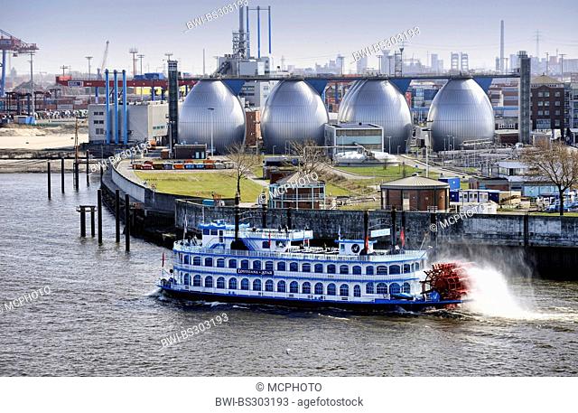 paddle wheeler Louisiana Star and digestion tanks of sewage work Koehlbrandhoeft in Port of Hamburg, Germany, Hamburg