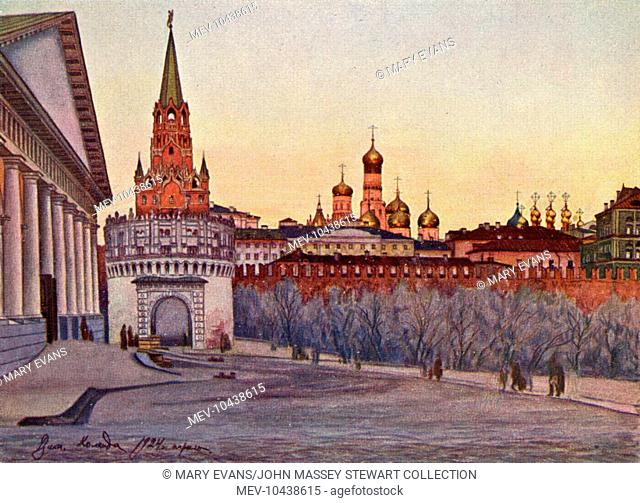 View of the Spasskaya Tower (left) on the eastern wall of the Kremlin complex, Moscow, Russia, at the corner of Mokhovaya Street and Vozdvizhenka Street