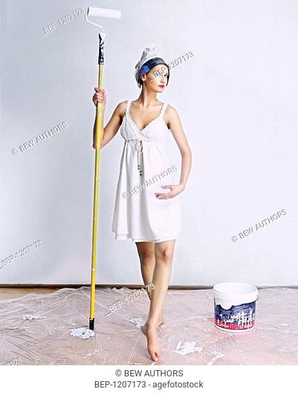 Woman painting flat