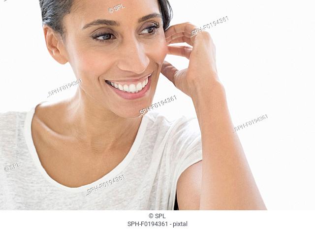 Woman smiling and looking away