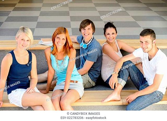 Group of college students sitting looking camera