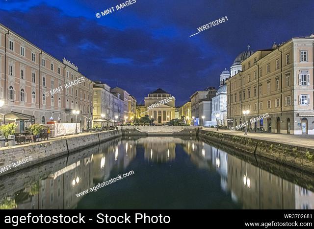 View of the Grand Canal lit up at night, Trieste, Italy