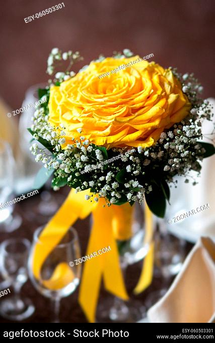 wedding bouquet of the bride. bouquet flower big rose assembled from a large number of roses petals. decorated with baby's breath