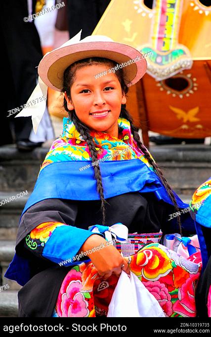 Young local woman performing suring Festival of the Virgin de la Candelaria in Lima, Peru. The core of the festival is dancing and music performed by different...
