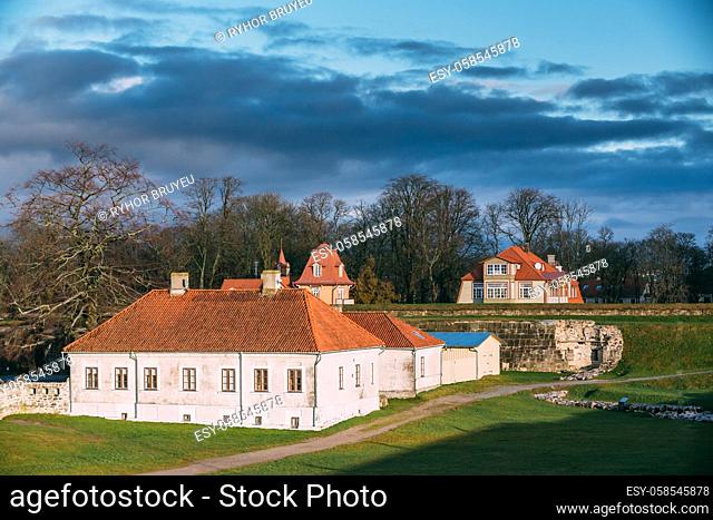 Kuressaare, Saaremaa Island, Estonia. Old House Building Near Episcopal Castle In Evening. Traditional Medieval Architecture, Famous Attraction Landmark