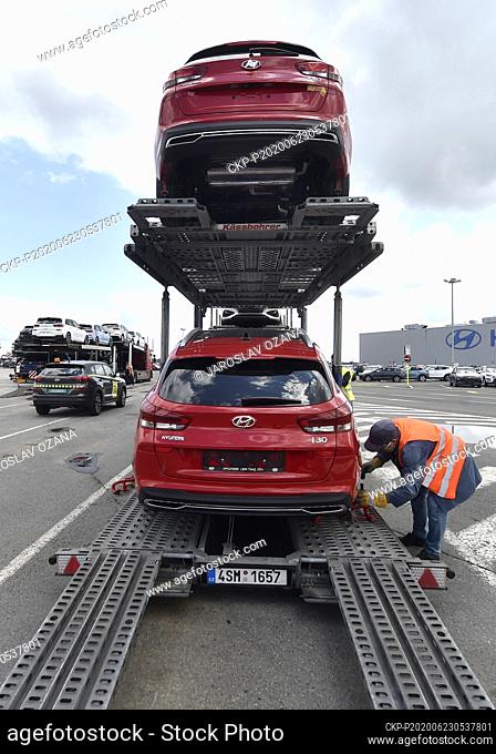 Employees of the Hyundai's Czech plant load new models of the Hyundai i30 onto a truck semi-trailer in Nosovice, Czech Republic, June 23, 2020