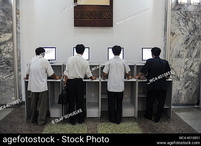 Pyongyang, North Korea, Asia - Men in front of computers use the intranet at the Grand People's Study House, the central library located in the North Korean...