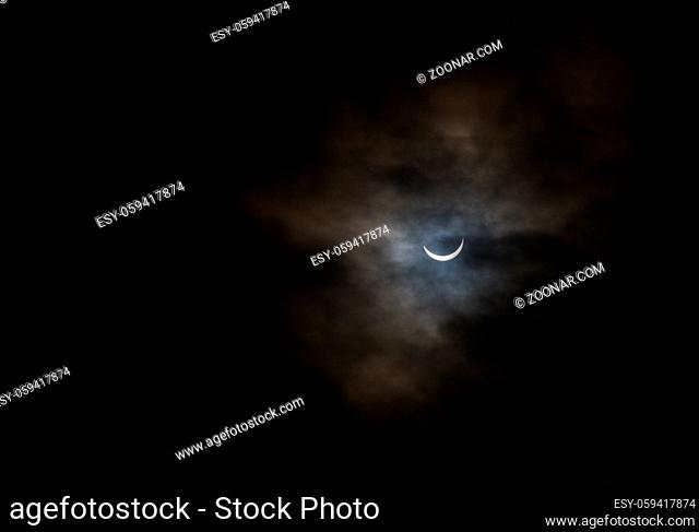 Partial Solar Eclipse on a Cloudy Day in Kristiansand Norway 20 march 2015