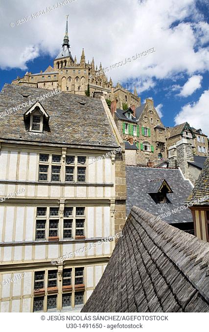 Typical and old houses under Mont-Saint Michel abbey, listed as World Heritage by UNESCO, Manche department, Lower Normandie region, France