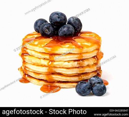 Pancakes with blueberries and syrup Isolated on white background