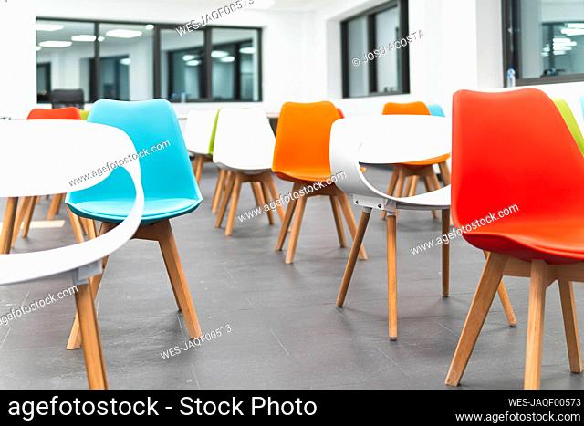 Empty chairs in education training classroom