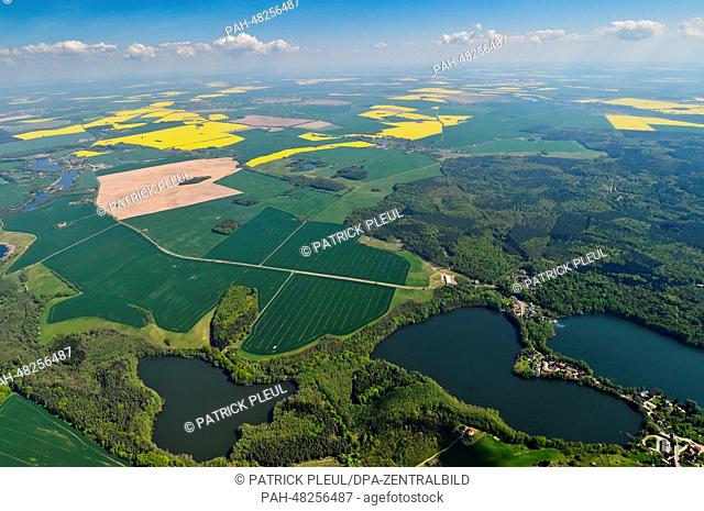 Aerial view of the landscape in Brandenburg showing the lakes (L-R) Muehlenteich, Burgsee and Schwarzer See in Falkenhagen near Seelow, Germany, 29 April 2014