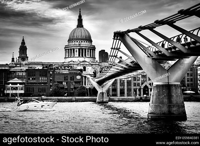 St Paul#39;s Cathedral dome seen from Millenium Bridge in London, the UK. Black and white