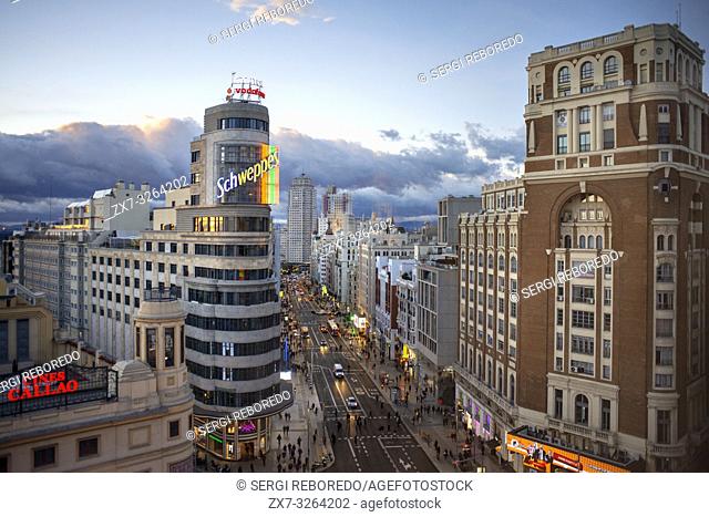Capitol building, Gran Via at the Iconic Schweppes Building. The street is the main shopping district of Madrid, Spain