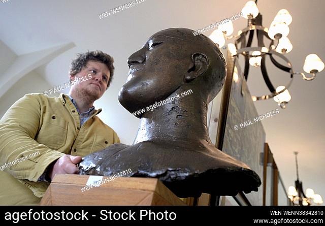 Star Attraction : Auctioneer John Rolfe with a signed, limited 1/6 bronze bust sculpture of Dame Elisabeth Frink (1930-1993) called 'Tribute I'