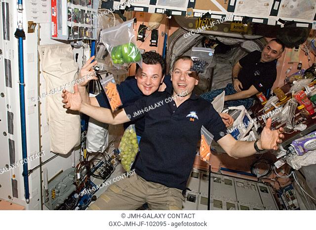 It's not difficult to identify the cause for celebration in this photograph taken inside Unity or Node 1 on the International Space Station on March 3