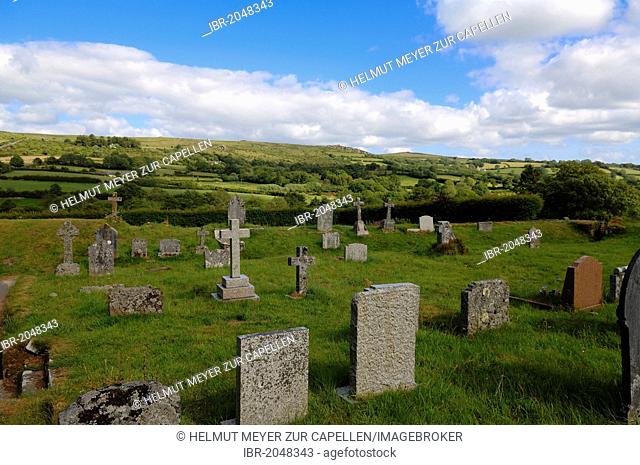 Old cemetery of the church of St. Pancras overlooking the landscape of Dartmoor, Widecombe in the Moor, Dartmoor, Devon, England, United Kingdom, Europe