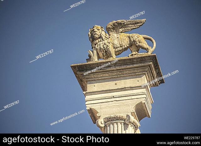 St. Mark winged lion statue in a italian stele in Rovigo