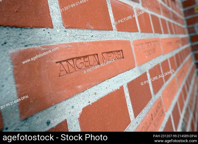 PRODUCTION - 06 December 2023, Brandenburg, Potsdam: Former German Chancellor A. Merkel supported the reconstruction with a ""brick donation""