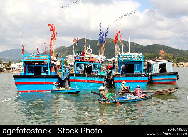 Fishing boats with flags in Nha Trang, Vietnam