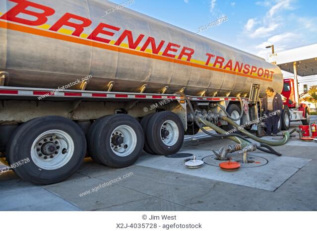 Roseville, Michigan. A tanker truck delivers gasoline to a Costco gas station