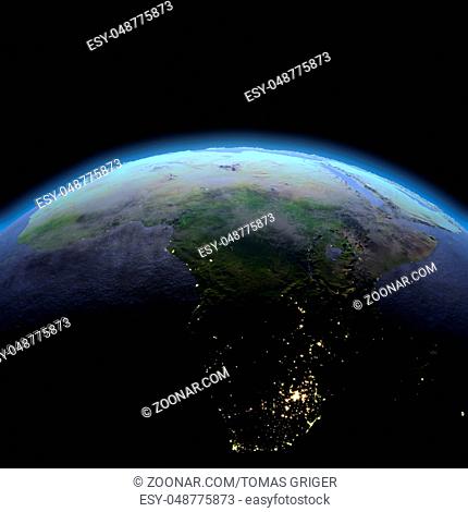 Africa in the dark at dawn. 3D illustration with detailed planet surface, atmosphere and visible city lights. Elements of this image furnished by NASA