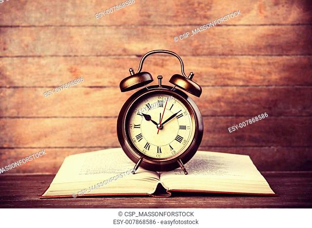 Alarm clock and book