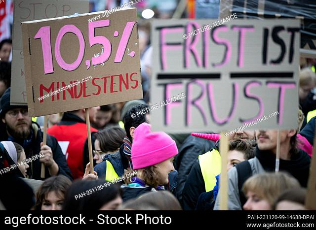 20 November 2023, Berlin: ""10.5% minimum"" and ""Deadline is frustration"" are written on signs during a warning strike at Berlin universities