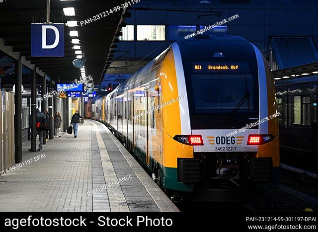 14 December 2023, Brandenburg, Potsdam: The Odeg regional express RE1 to Brandenburg an der Havel is standing on the platform at the main station
