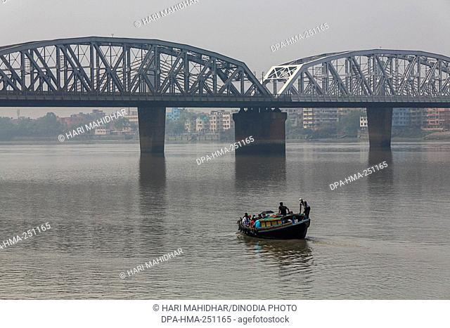 Wooden boats in hooghly river, kolkata, west bengal, india, asia