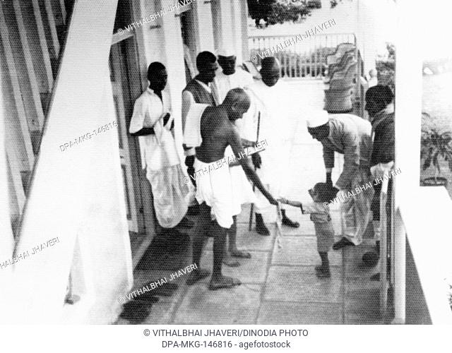 Mahatma Gandhi greeting a small boy , 1946 , Sardar Vallabhbhai Patel , India NO MR