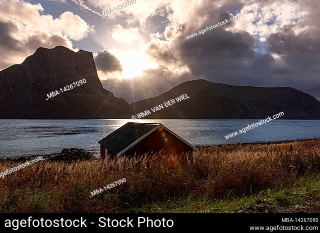 Autumn impressions from the Norwegian island Senja above the Arctic Circle, Scandinavia and Norway pure, typical for the island, the red boat houses