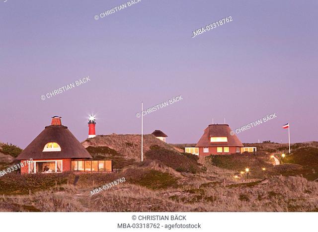Lighthouse and thatched-roof houses in Hörnum, island Sylt, Schleswig - Holstein, Germany
