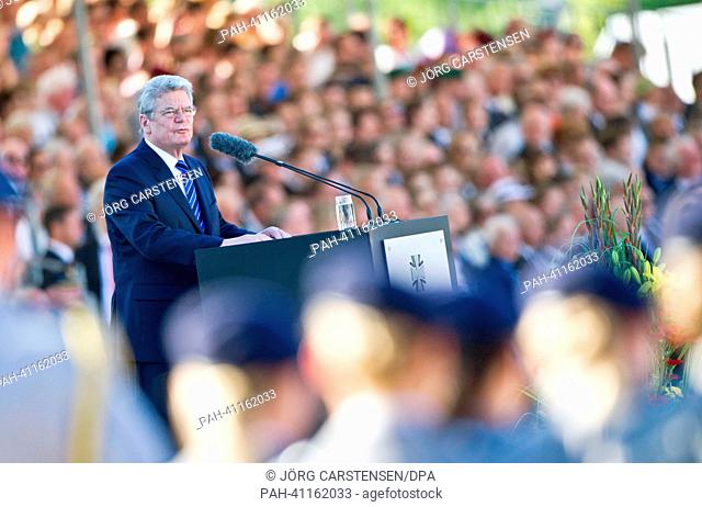 German President Joachim Gauck gives a speech during the ceremonial swearing-in outside of the Reichstag building in Berlin,  Germany, 20 July 2013