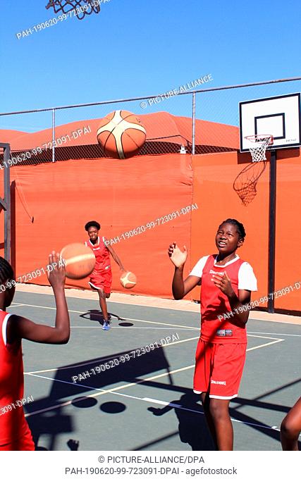 05 June 2019, Namibia, Windhuk: Children from poor families play basketball in Namibia's capital Windhoek in an institution financed with German aid money