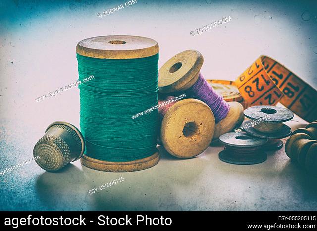 Creative service, the image of sewing accessories for needlework and sewing, a hobby, on a white background, in retro style