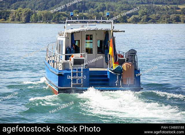 Maneuvering the water police boat on the Uberlinger See during an exclusive photo session at the water police station in Uberlingen